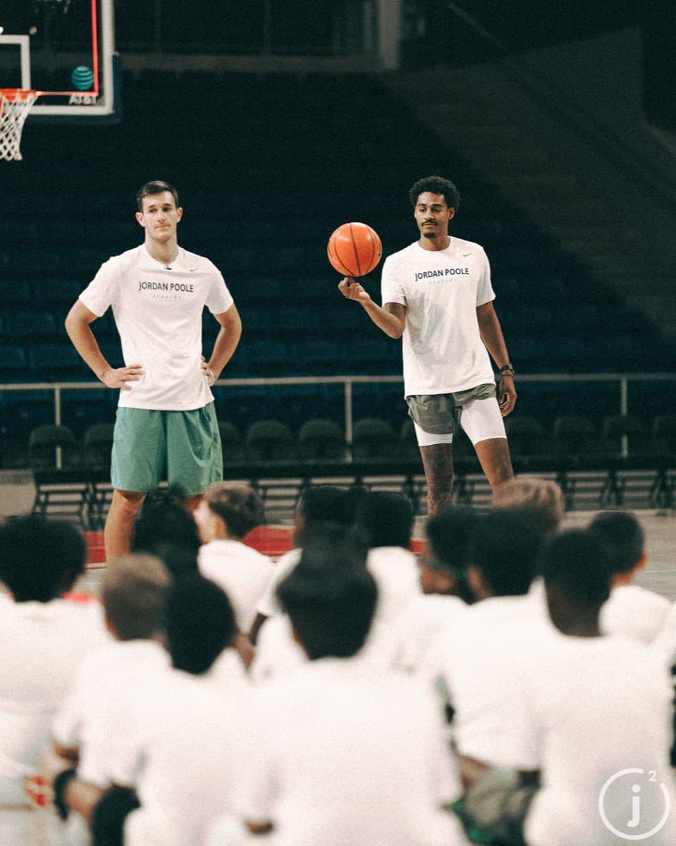 Joey Hewitt and Jordan Poole at basketball camp