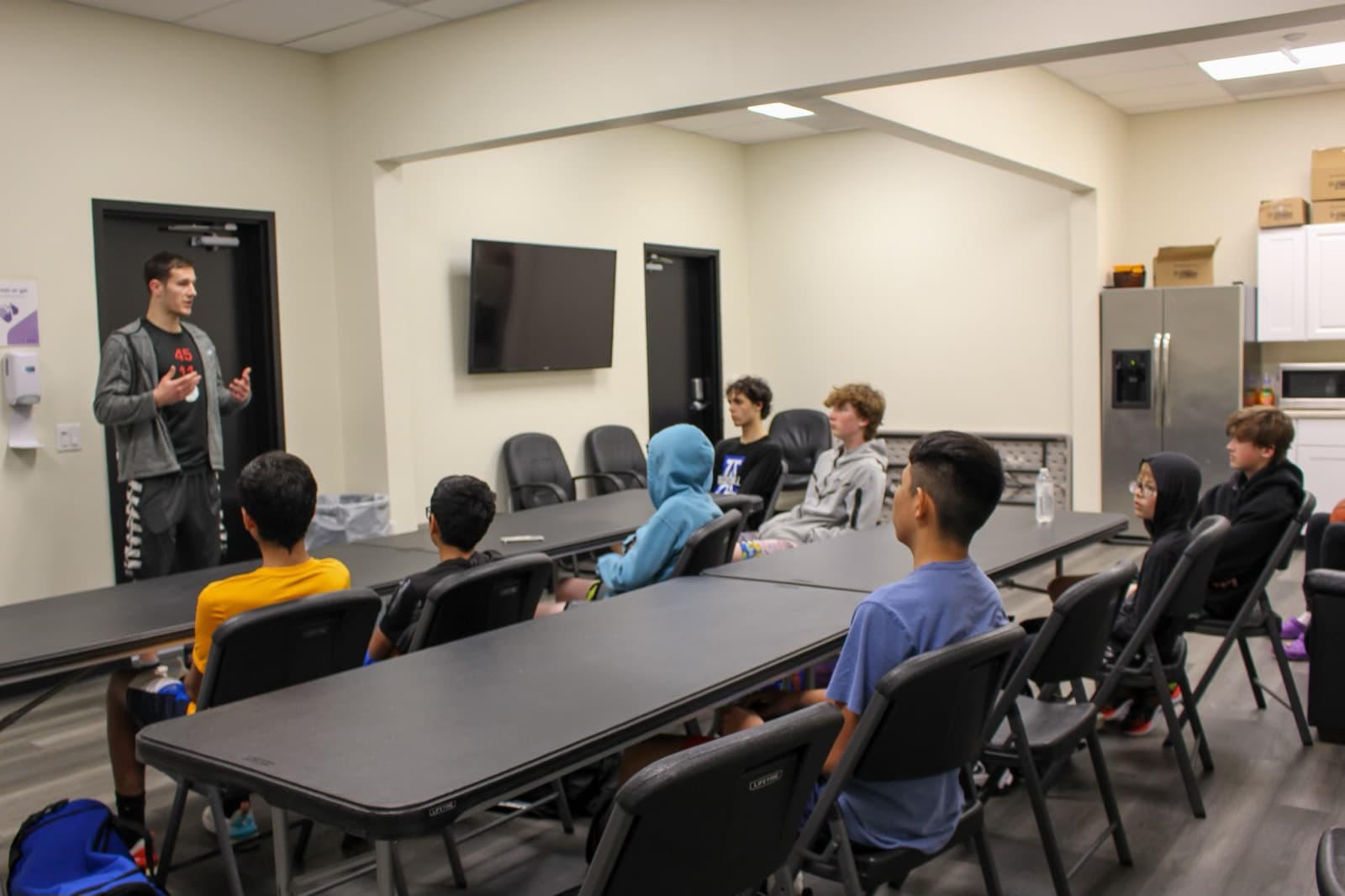 Joey Hewitt leading a mindset session with young athletes